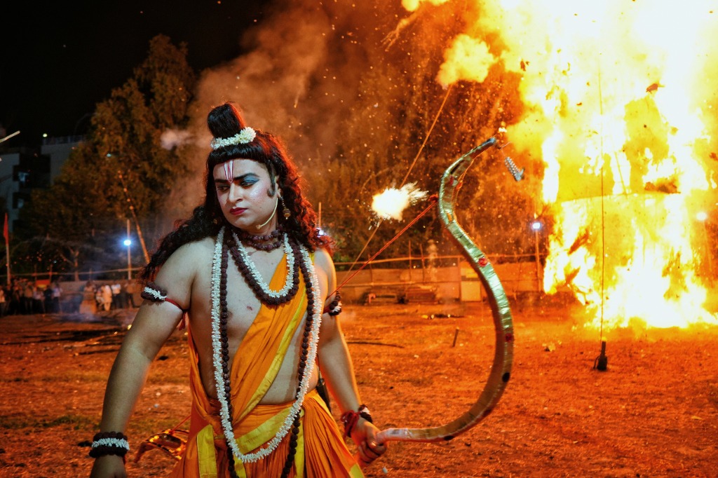 Sacred fire and performer in traditional Ramayana costume